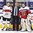 PLYMOUTH, MICHIGAN - MARCH 31: Switzerland's Livia Altmann #22 and Czech Republic's Klara Peslarova #29 are presented with the player of the game awards by USA Hockeys Mike Bertsch during preliminary round action at the 2017 IIHF Ice Hockey Women's World Championship. (Photo by Minas Panagiotakis/HHOF-IIHF Images)
